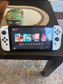 Nintendo Switch OLED White + 256gb Mario Star SD Card Bundle (does not include games in video)