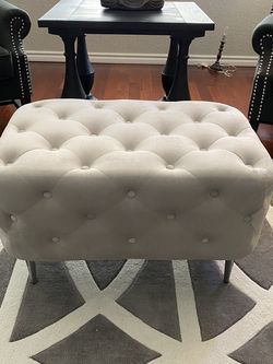 Please don’t ask if it’s available. They are readily available. Gray tufted ottoman.
