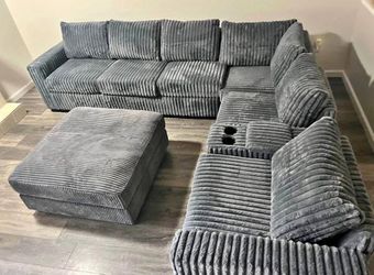 Jumbo corduroy sectional sofa with ottoman and console