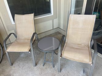 Set of patio chairs and foldable table