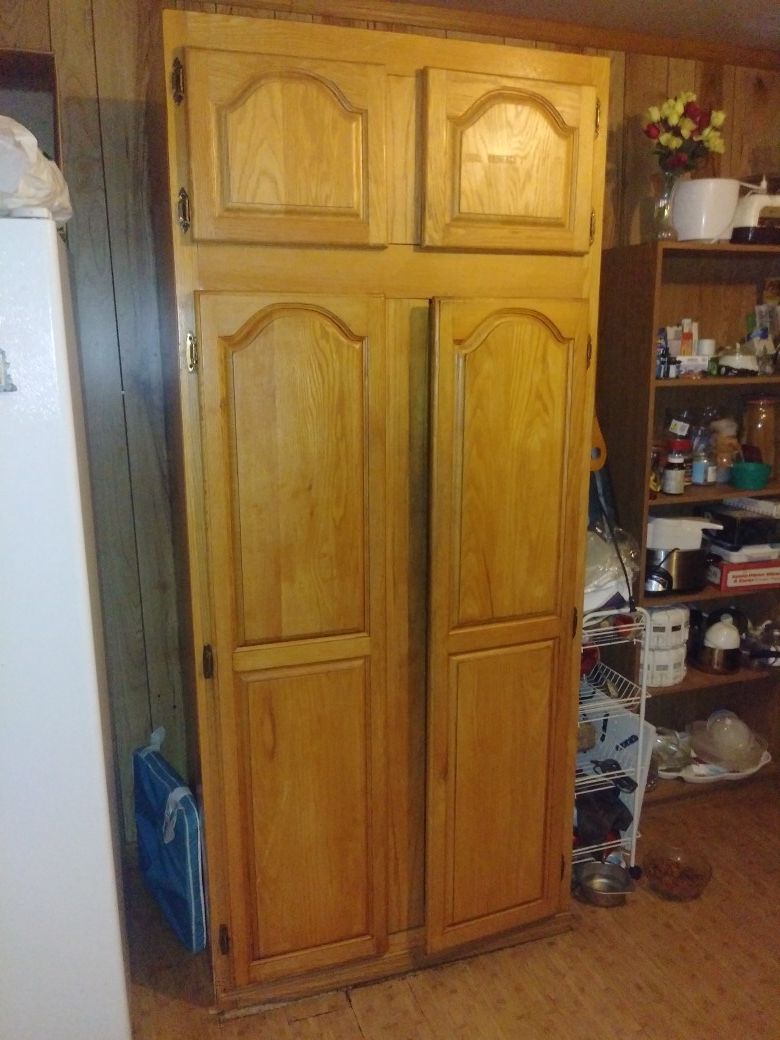 7 ft tall x 2 ft 2.5in x 3ft 2.5in wood 4 door cabinet / shelves storage