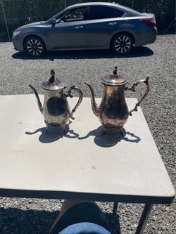 Two antique silver tea pots