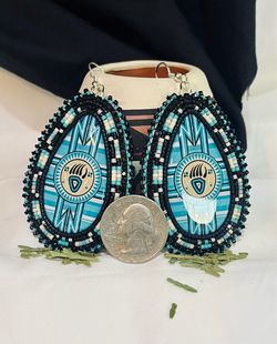 Blue bear claw beaded earrings