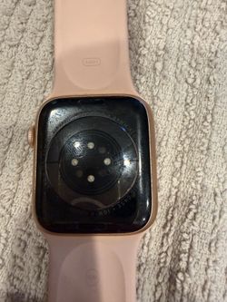 Apple Watch Series 6 (GPS + Cellular, 44mm) in a Gold Aluminum case with a Pink Sand Sport Band