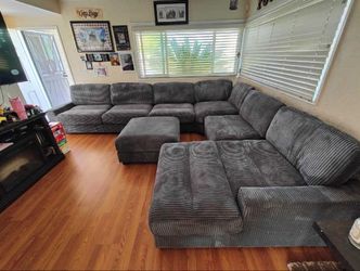 7-Piece XL Charcoal Modular Sectional Sofa with Ottoman - New