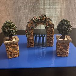Dept 56 Stone Corner Posts with Holly Tree And Stone Archway