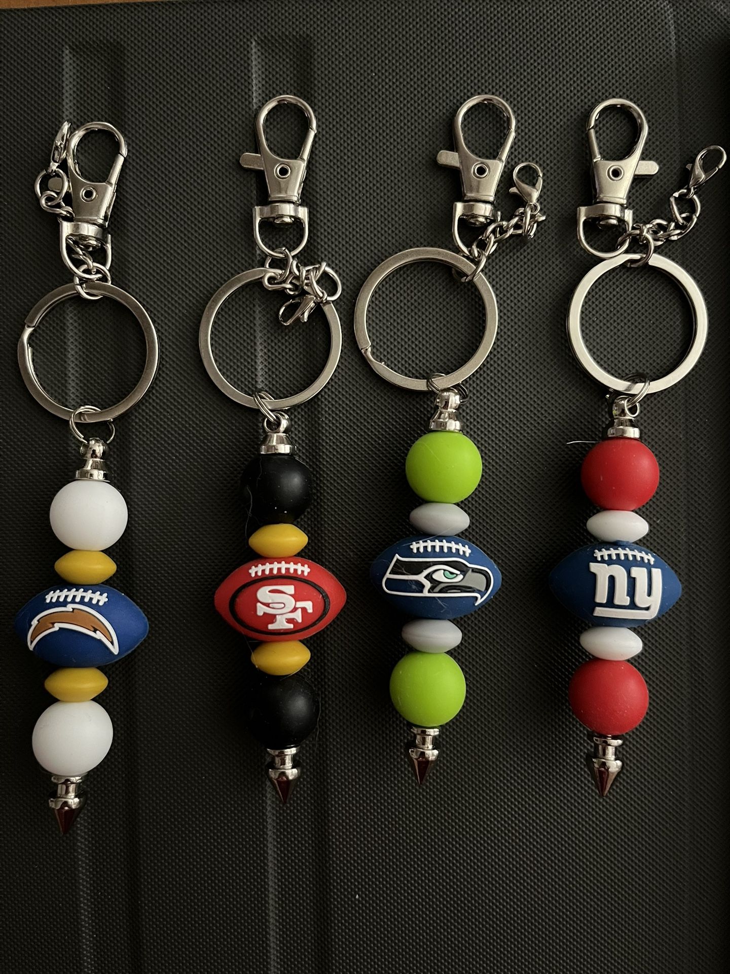 NFL Football Keychains-5 Pictures- See Info For Availability