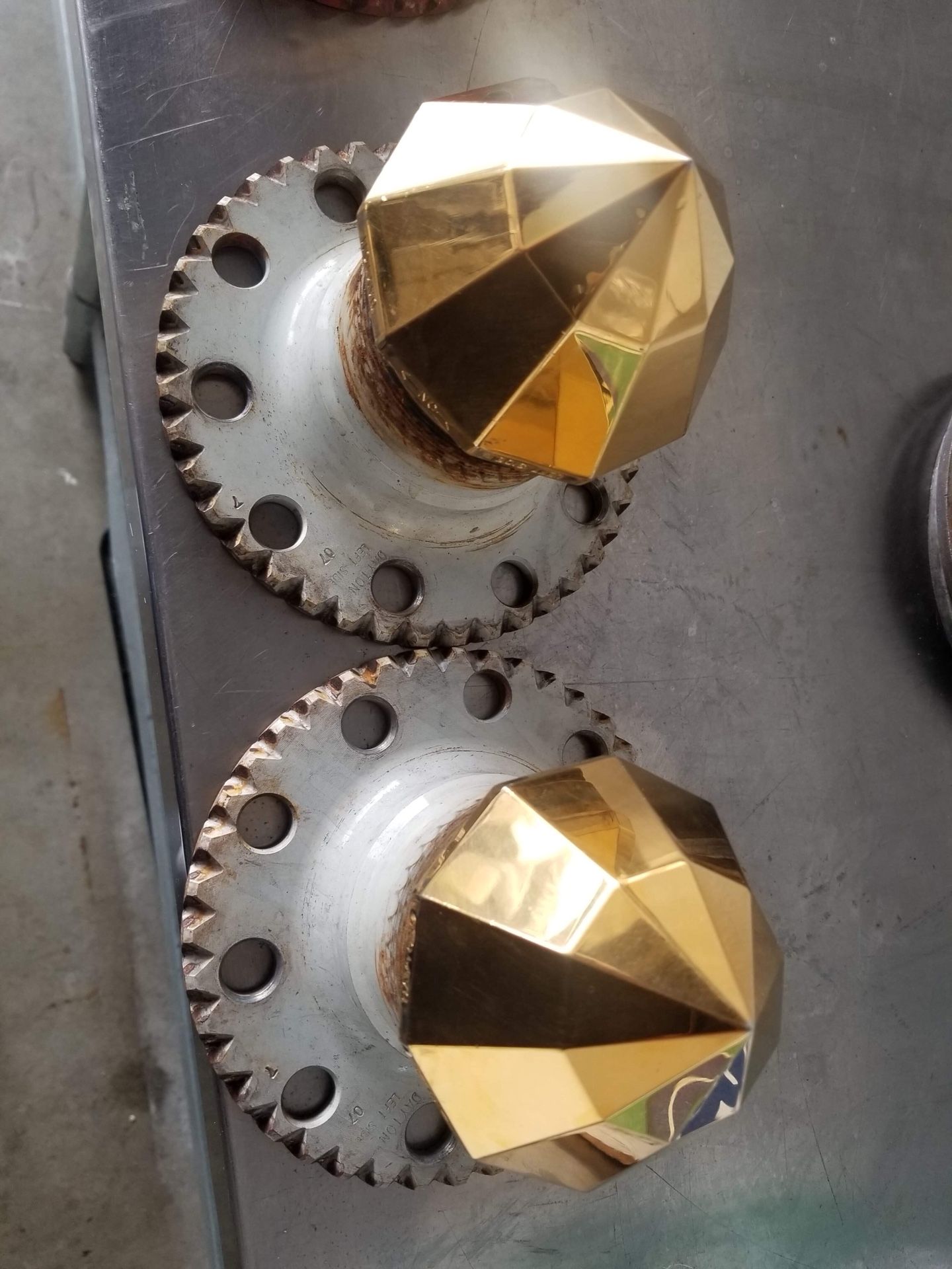 Gold Dayton wire wheel bullet knockoffs