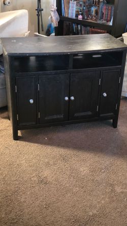 Black TV Stand with exhaust fans.