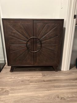 Dark Wood Sunburst Cabinet with Ring Handle