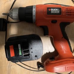 Black & Decker drill battery and charger included