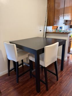 Ikea dining table + Ikea Bar stool chairs