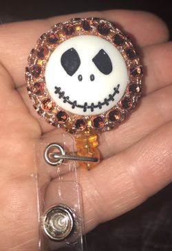 Retractable badge reel