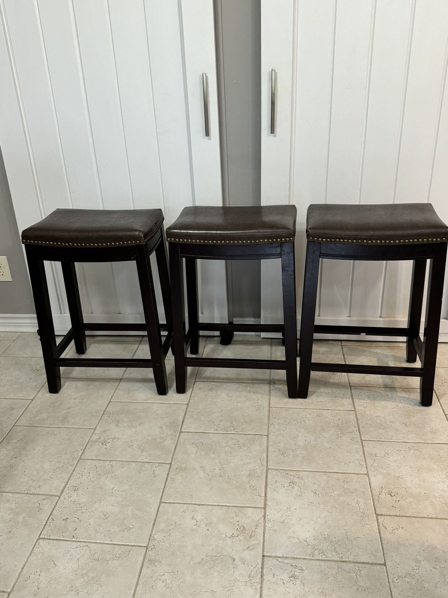 3 Counter Height Brown Wood Bar Stools With Leather Padded Seats