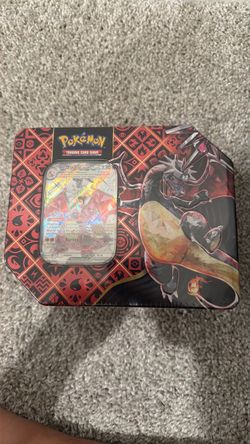 paldean fates charizard tin