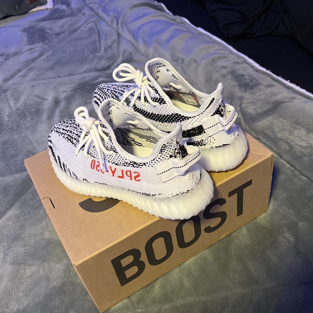 Flight club zebra yeezy deals