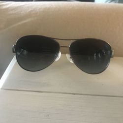 Coach aviator sunglasses.