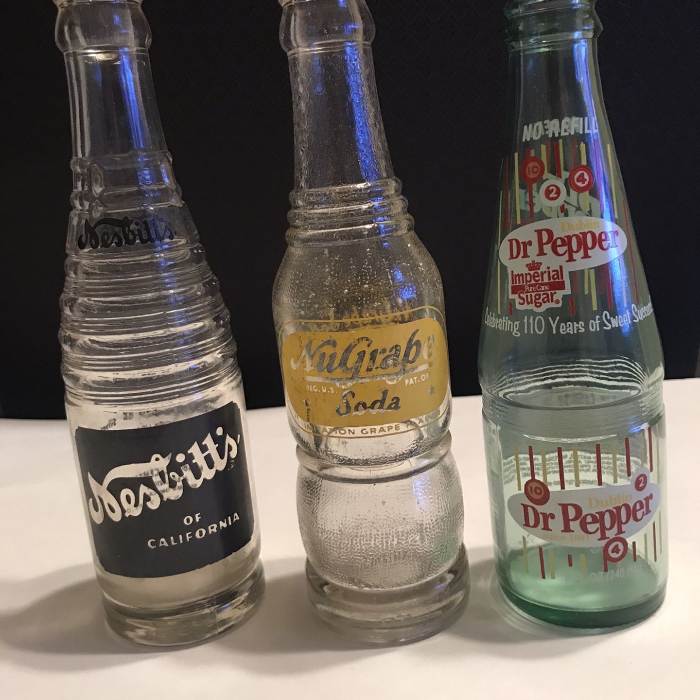 Vintage NuGrape Soda, Vintage Nesbitt’s of California, & Dr Pepper Bottle