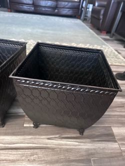 Two  large dark brown metal decorative  containers