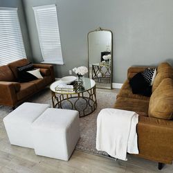 5 seater couches, 2 stools and center consol table