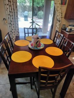 Wood table with 6 cushion chair
