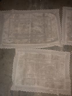 Beige bathroom floor mats