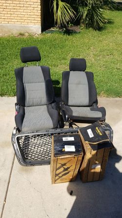 Bucket seats, struts, and ford f 150 grill