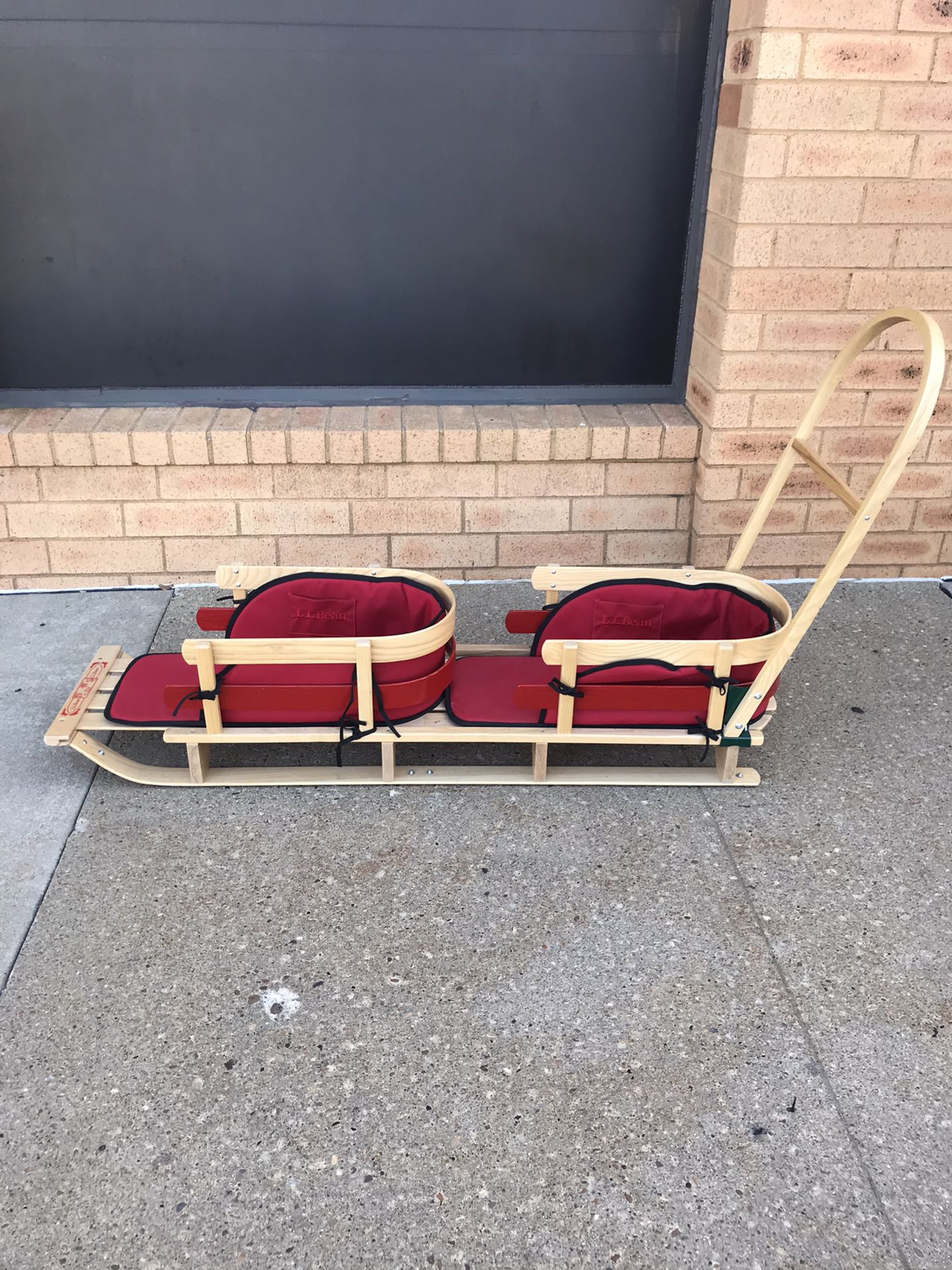 Large LL Bean Kid's tandem Wooden Pull Sled With Red Cushion Excellent Condition.