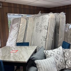 Brand new twin mattress sets for $200 both pieces