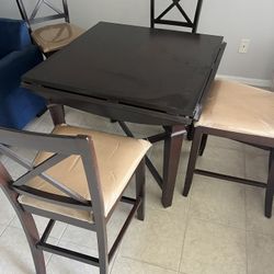 Table & 4 Chairs With Covers