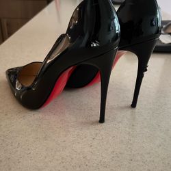 Christian Louboutin (RedBottoms) 