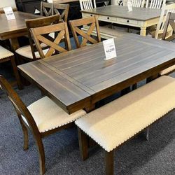 Moriville Grayish Brown Extendable Dining Set Table Chairs  Bench