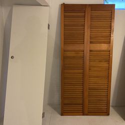 4 Solid Wood Doors. Two Are Bifold 