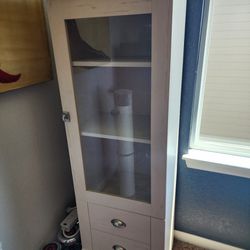 Glass Cabinet With Shelves And Drawer