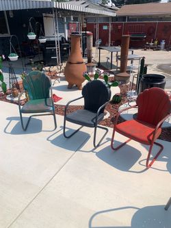 Vintage metal clam chairs