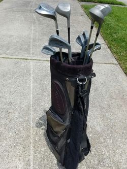 Golf Stand + Some Clubs