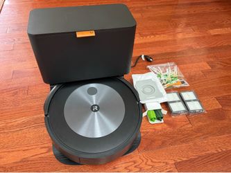 iRobot Roomba j7+ Self-Emptying Robot Vacuum with Extra Parts