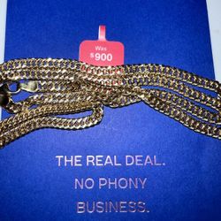 10. Karat gold diamond cut Cuban.