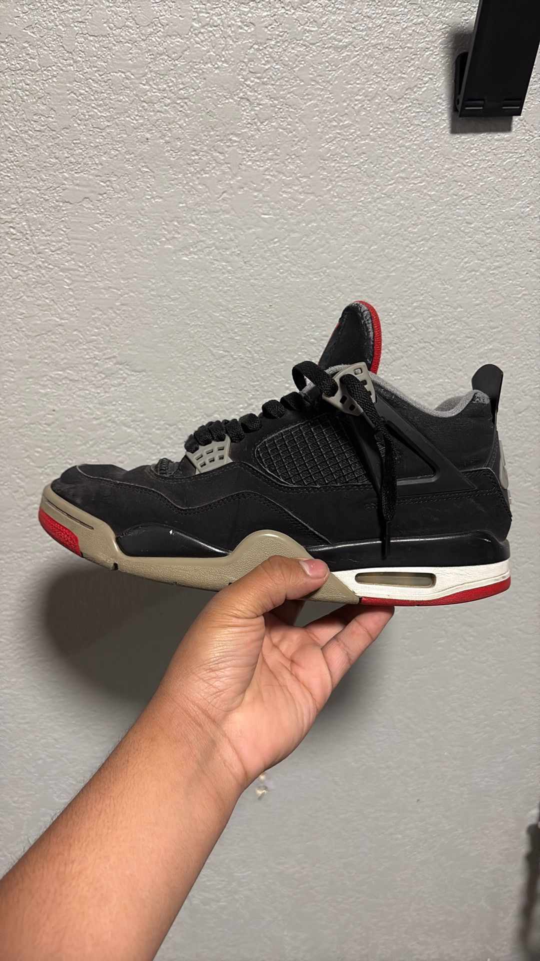 Size 9.5 Jordan 4 Breds