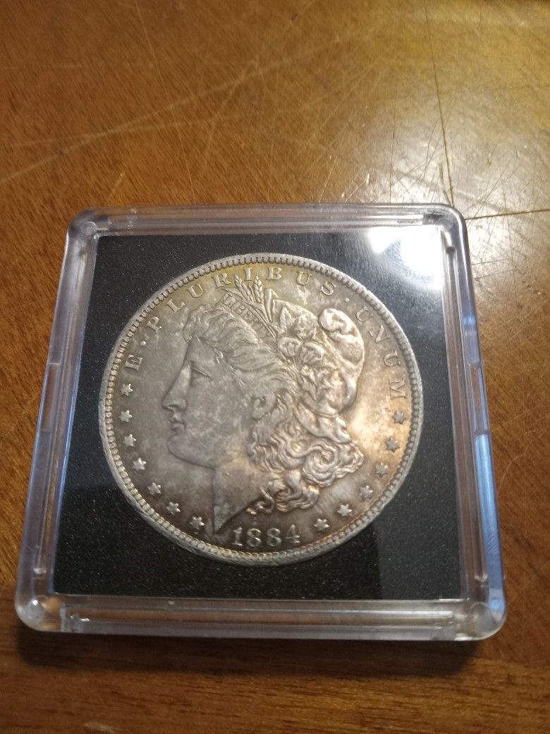 1884 O Toned BU Silver Morgan Dollar