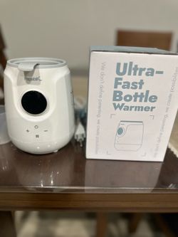 Ultra fast bottle warmer