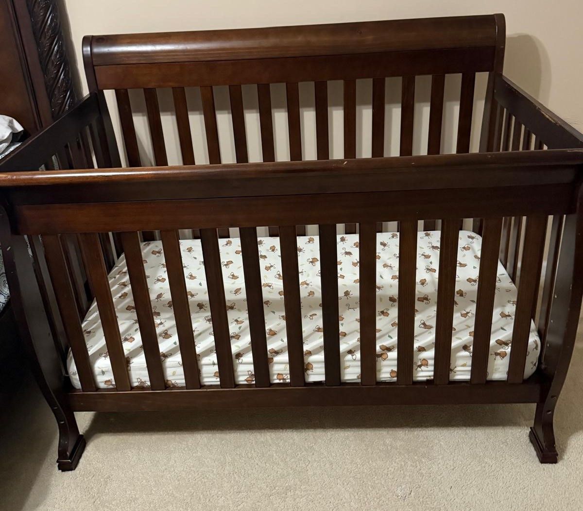 DaVinci Kalani 4-in-1 Convertible Crib with crib size mattress and bedding set