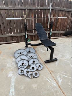 Bench press with 7ft 45lbs bar and 235lbs of Olympic weights