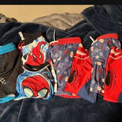 Used Boys swim shorts with new splash guard shirts  Size 6/7