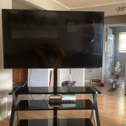 65’ Tv And Mounted Tv Stand 