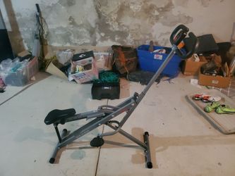 BRAND NEW ROW-RIDE WORK OUT MACHINE.