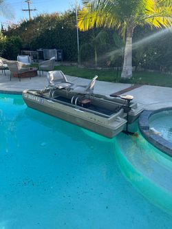 Small Fishing Boat with Trolling Motor
