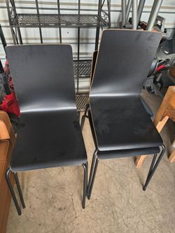 4 black chairs