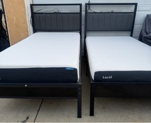 Two nice twins beds with good mattress $150 each or $300 both