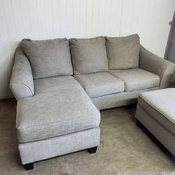 Couch with reversible ottoman